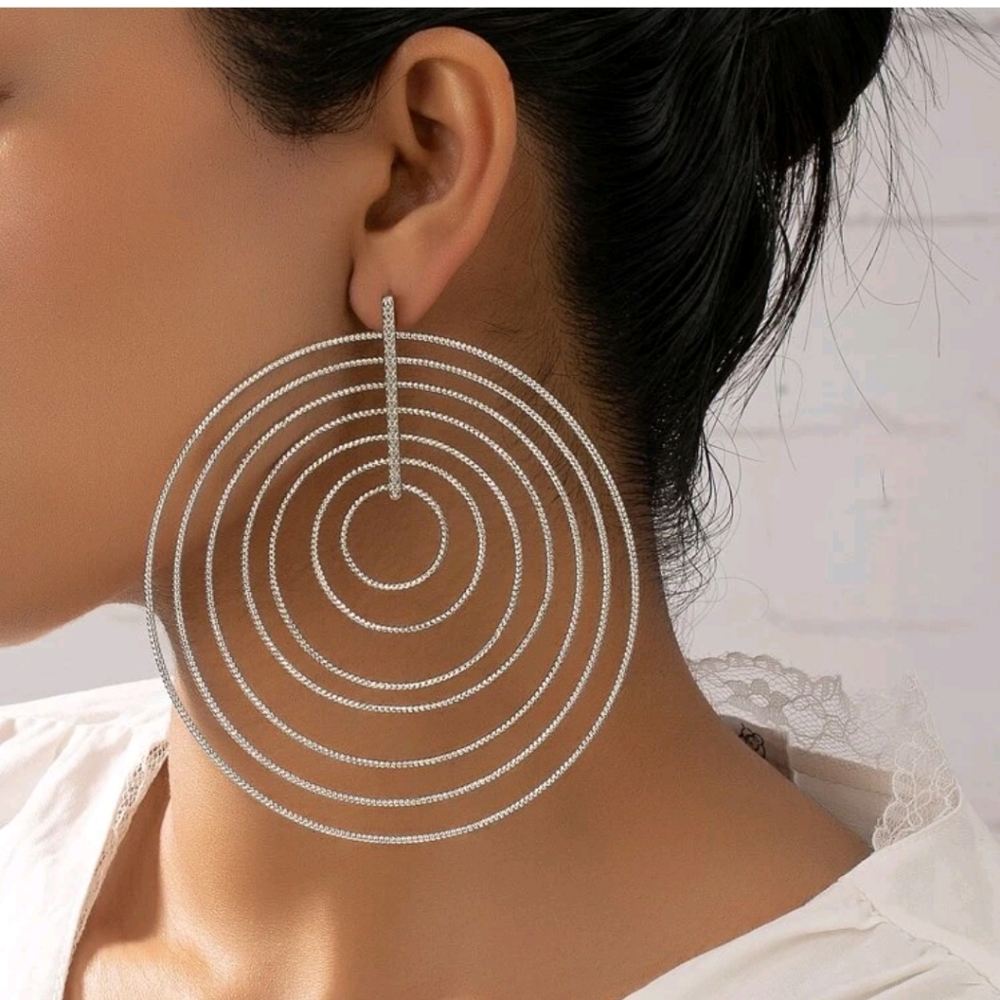 Layered oversized earrings